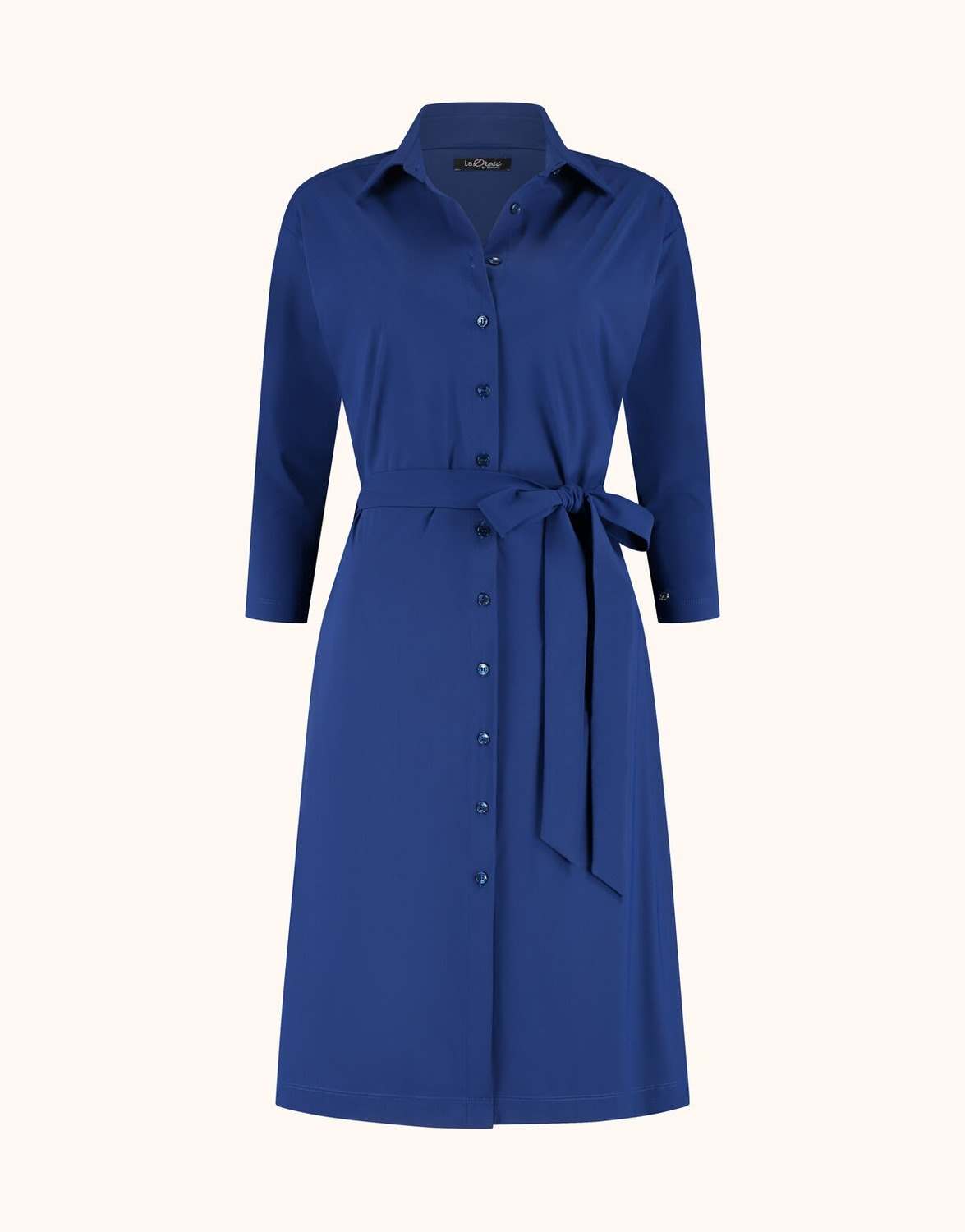 Packshot of the Angela Sapphire Blue shirt dress with a button front and tied belt.