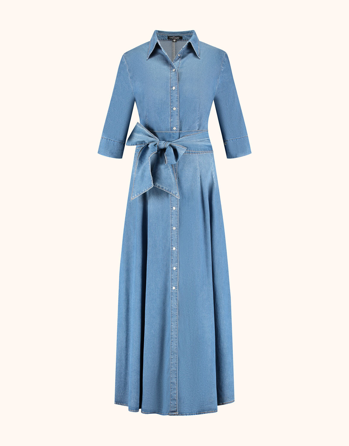 Packshot of the Alba Blue Indigo denim maxi shirt dress with a button front and belt.