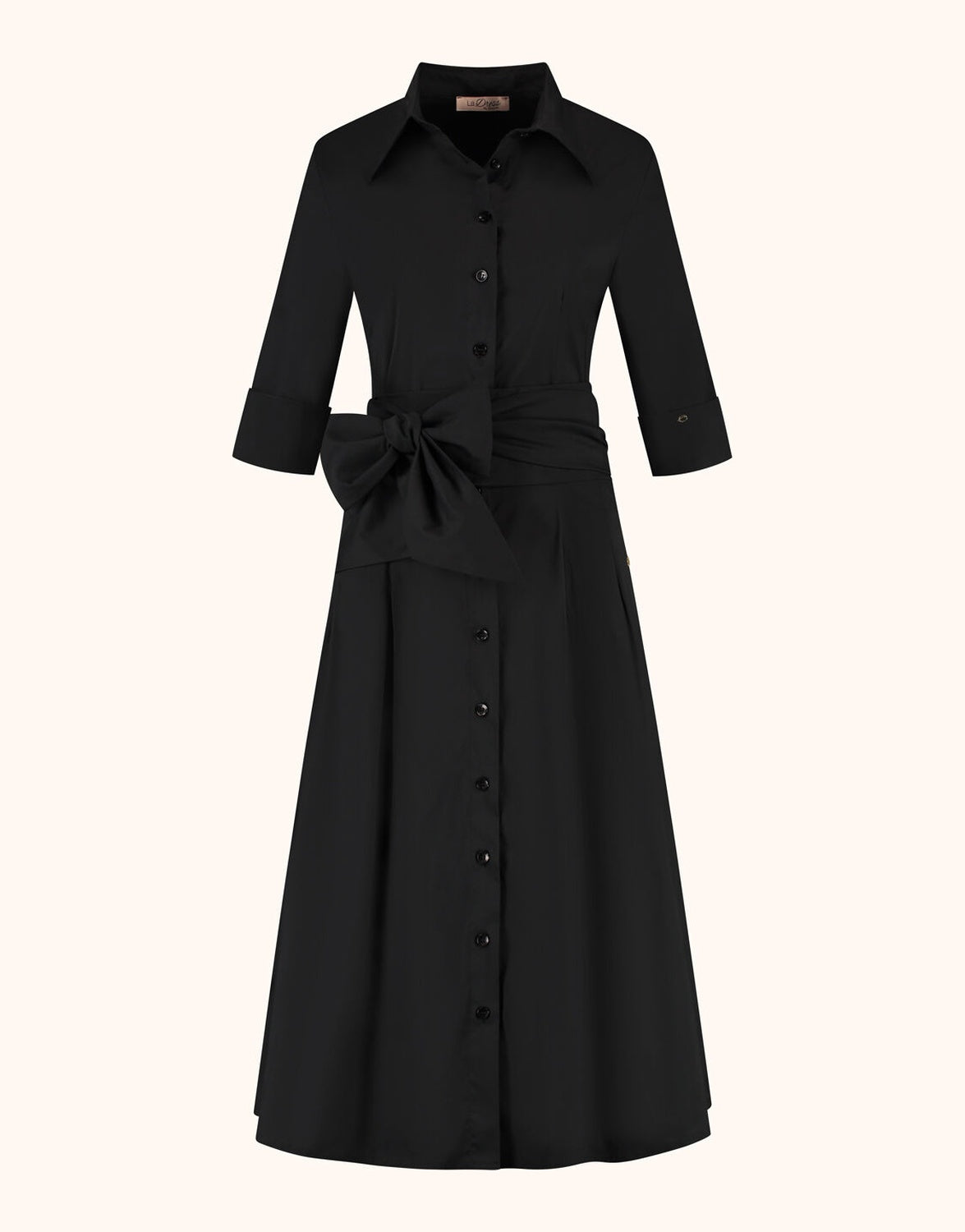 Packshot of the Vera Black dress in cotton stretch poplin with a collar and tie belt.