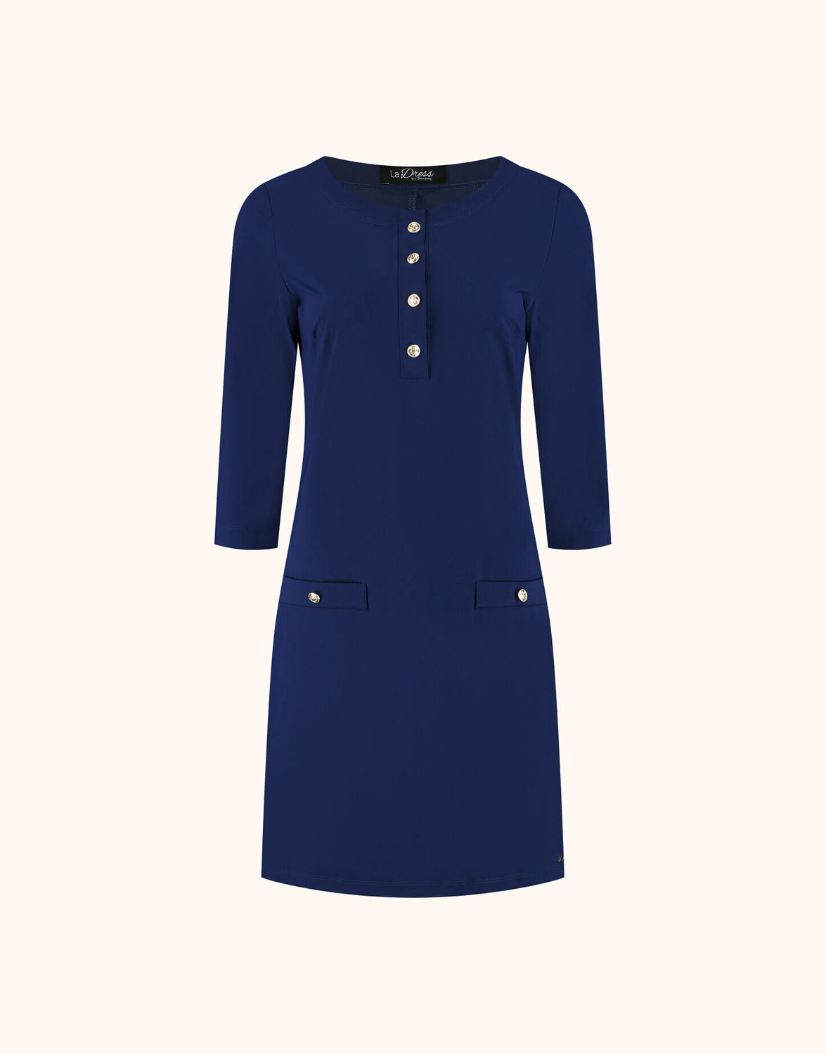 Packshot of the Pearl Sapphire Blue dress in jersey lycra with buttons and patch pockets.