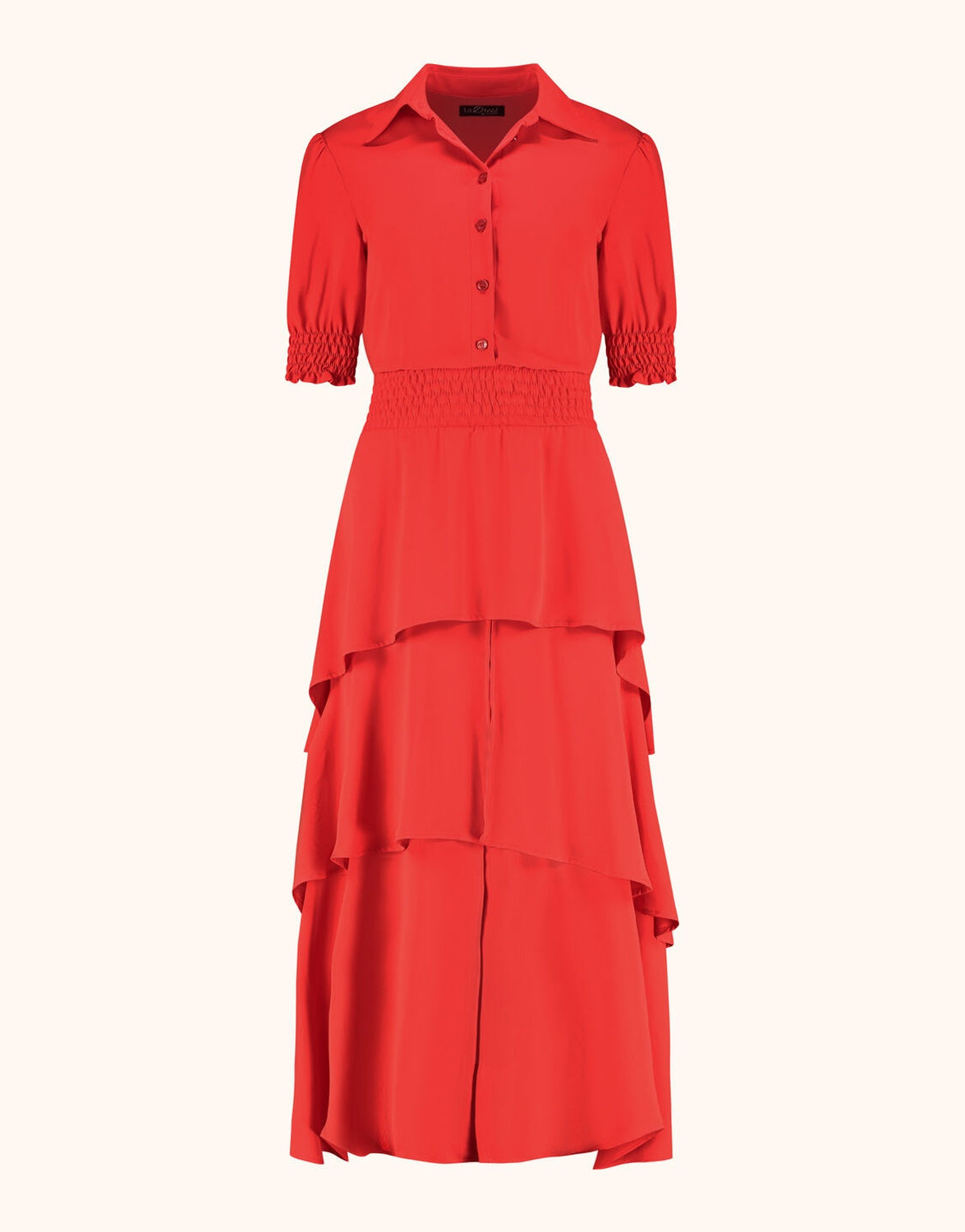 Packshot of the Kiki Hibiscus dress in crepe georgette with a collar and smocked waist.