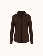 Packshot of the Esmee Espresso blouse in jersey lycra with a collar and two chest pockets.