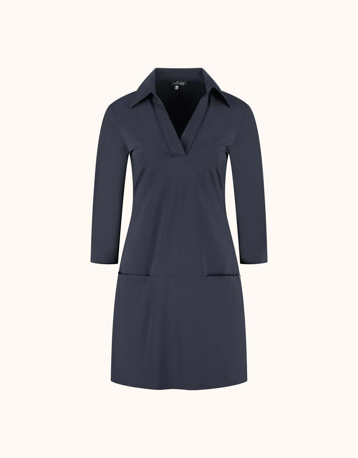 Packshot of the Nala Midnight Blue dress in jersey lycra with a collar and patch pockets.