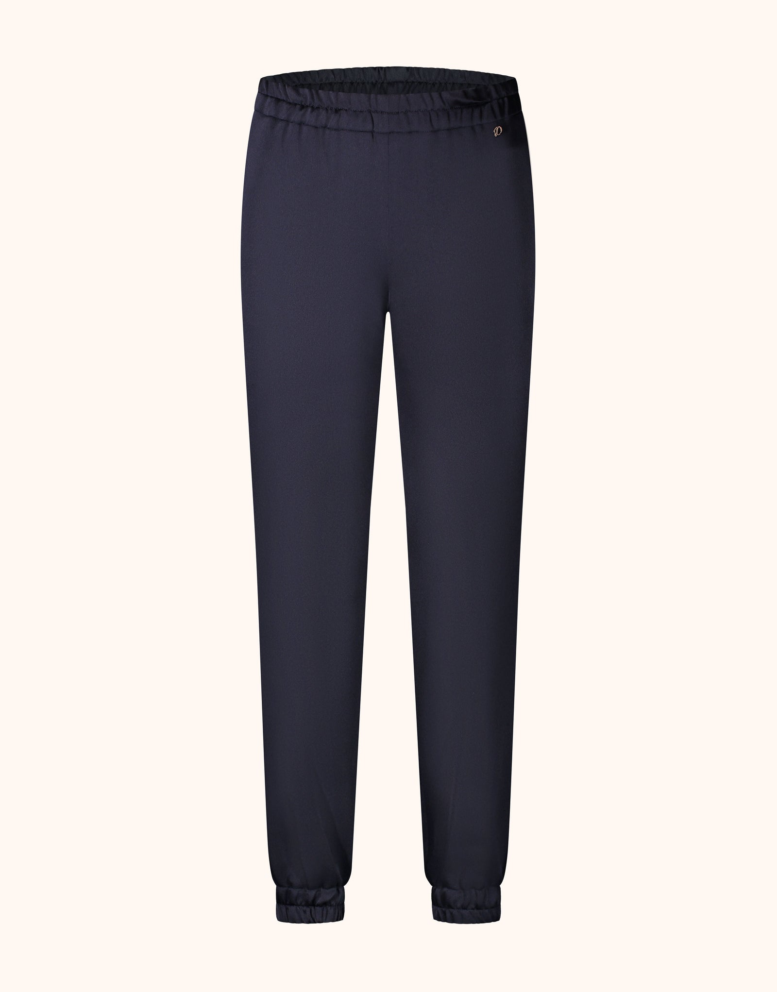 Packshot of the Verona Midnight Blue Satin trousers in crepe satin with cuffed hems.