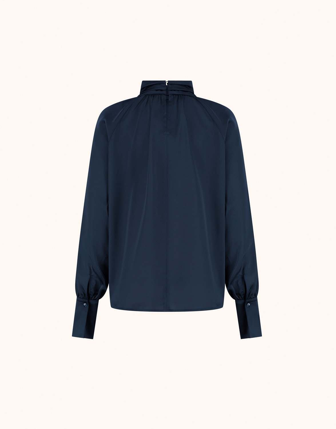 Packshot of the Alix Midnight Blue satin blouse with balloon sleeves and buttoned cuffs.
