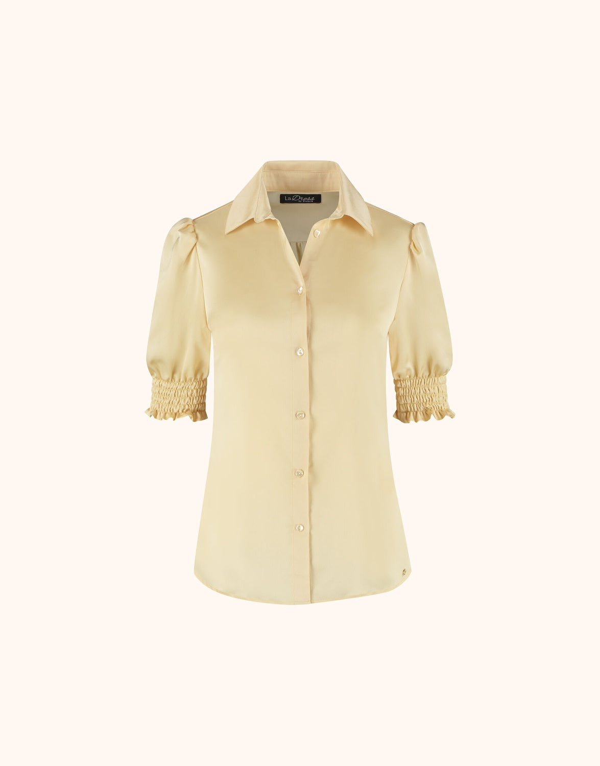 Packshot of the Miuccia Buttery yellow blouse in satin with a collar and smocked cuffs.
