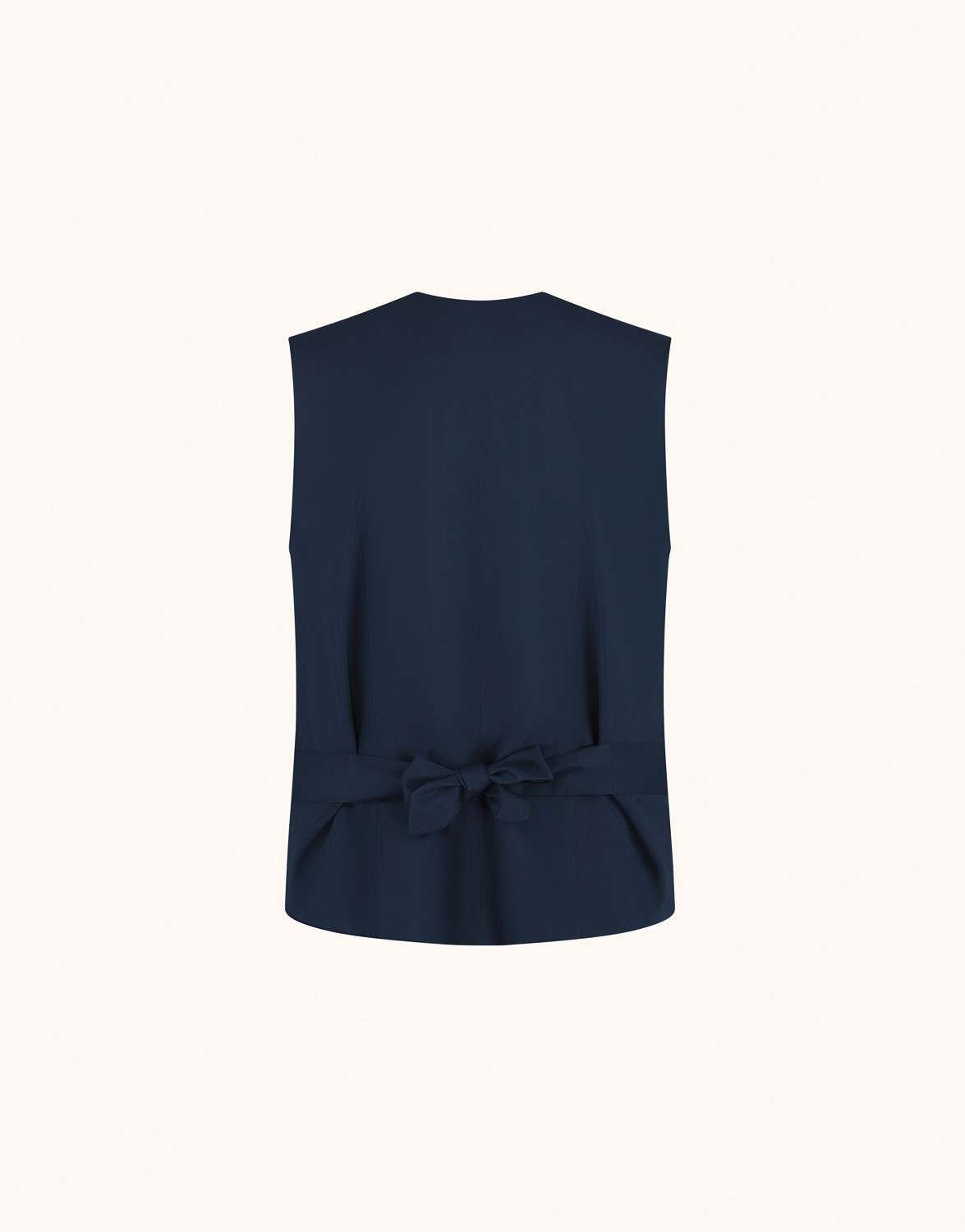Packshot of the Jolene Midnight Blue waistcoat in crepe satin seen from the back, with a bow.