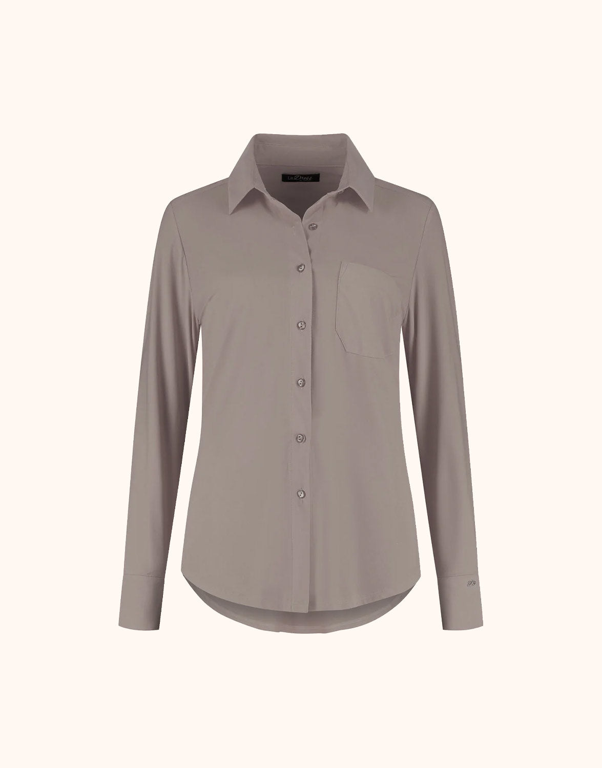 Packshot of the Annie Soft Taupe shirt in jersey lycra with a collar and a chest pocket.