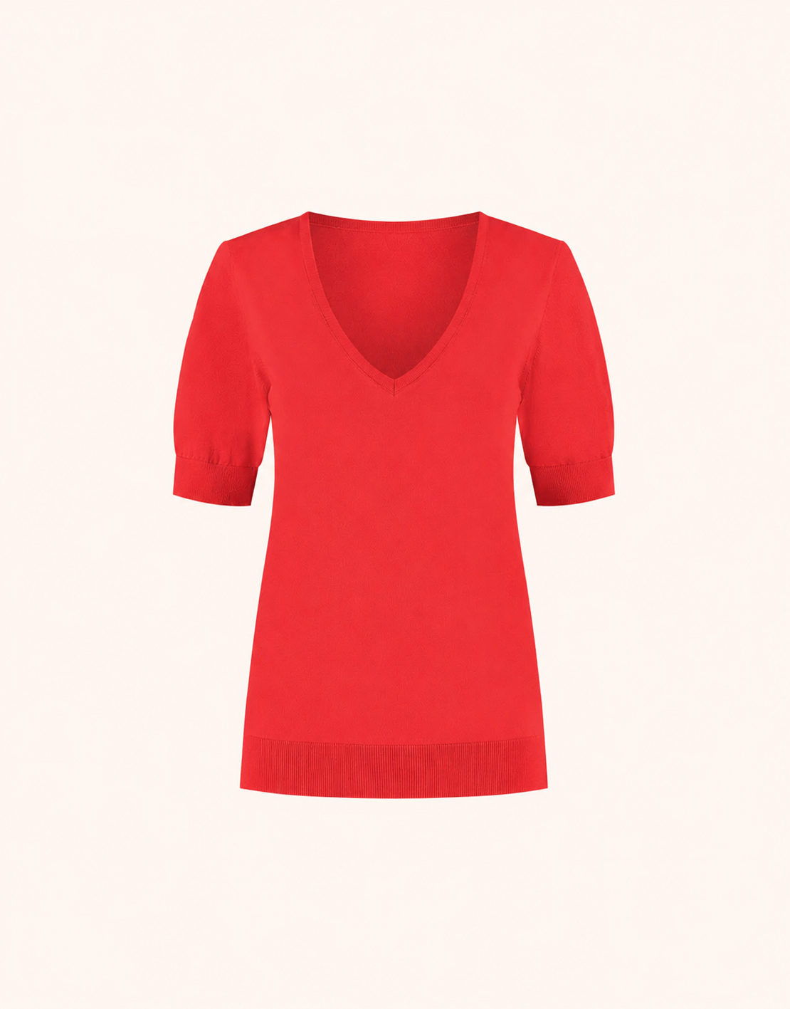 Packshot of the Marie Hibiscus jumper in organic cotton knit with a V-neck and short sleeves.