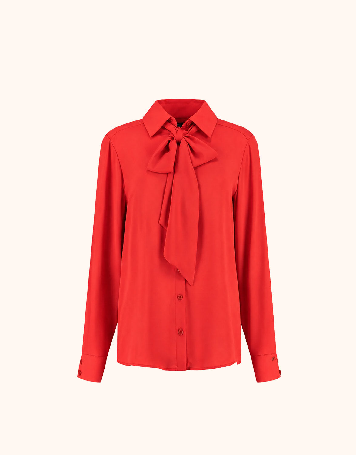 Packshot of the Kris Hibiscus blouse in crepe georgette with a pussy bow collar.