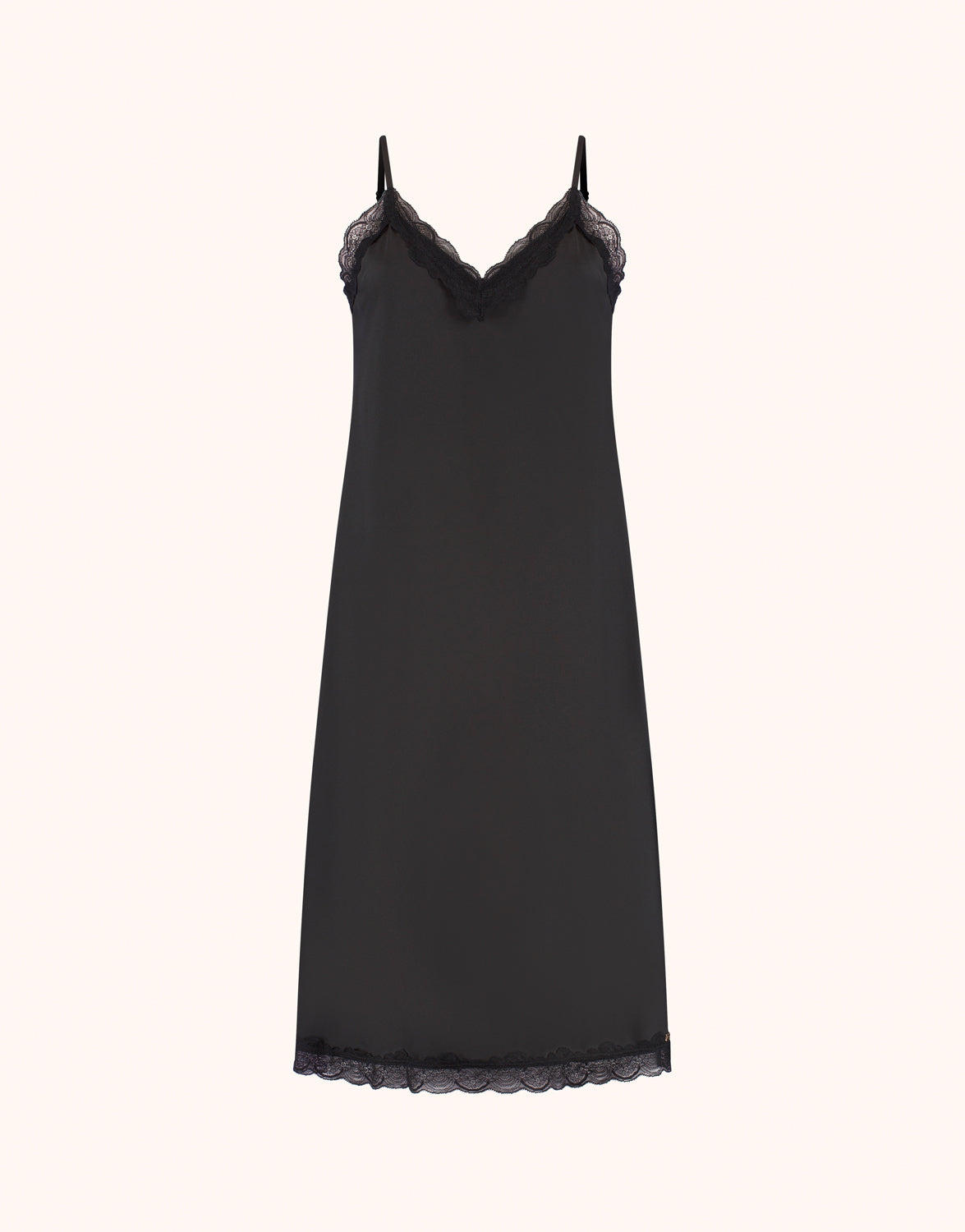 Packshot of the Aurora Black slip dress with thin straps and a lace trimmed hem.