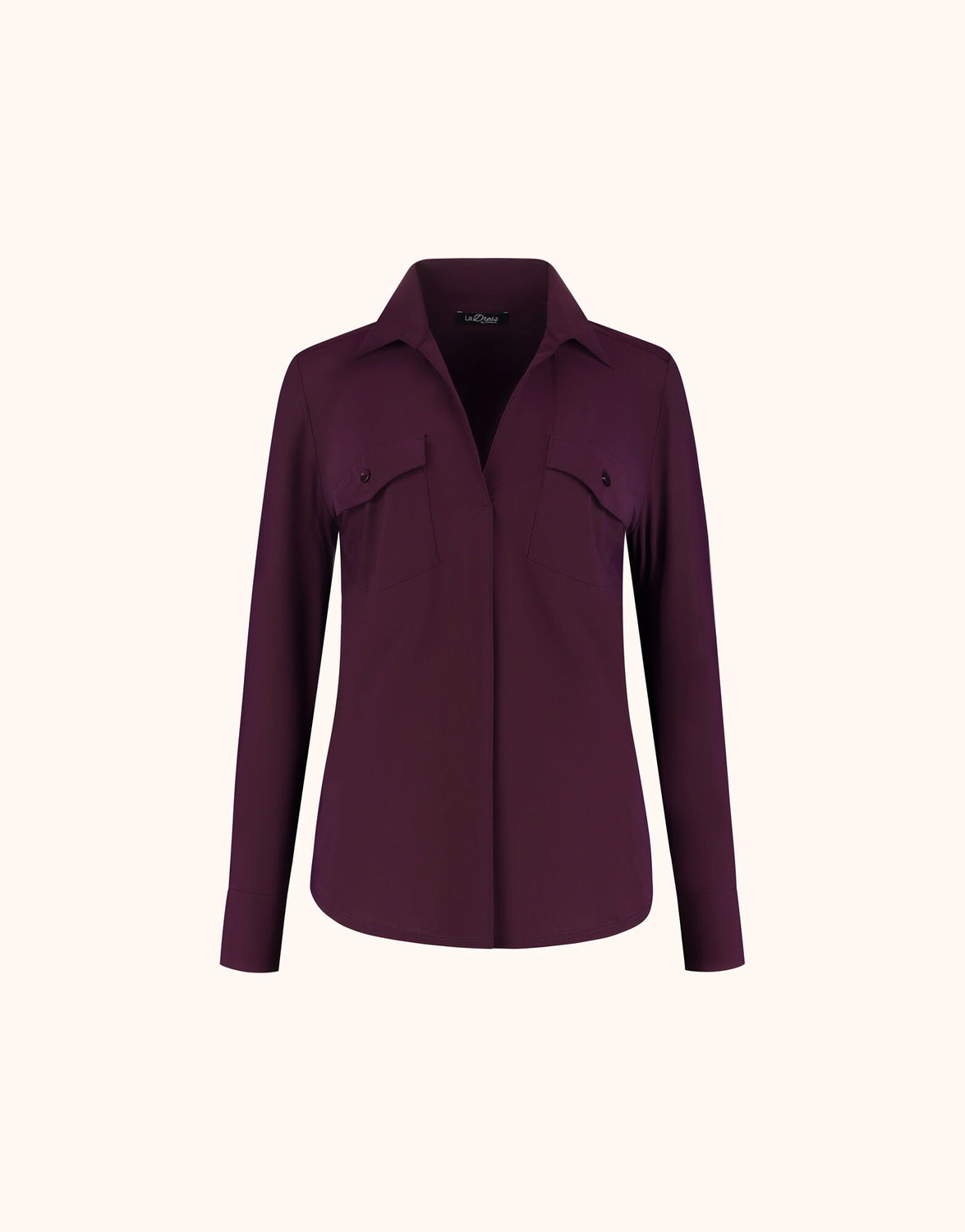 Packshot of the Esmee Deep Aubergine blouse in jersey lycra with a collar and chest pockets.