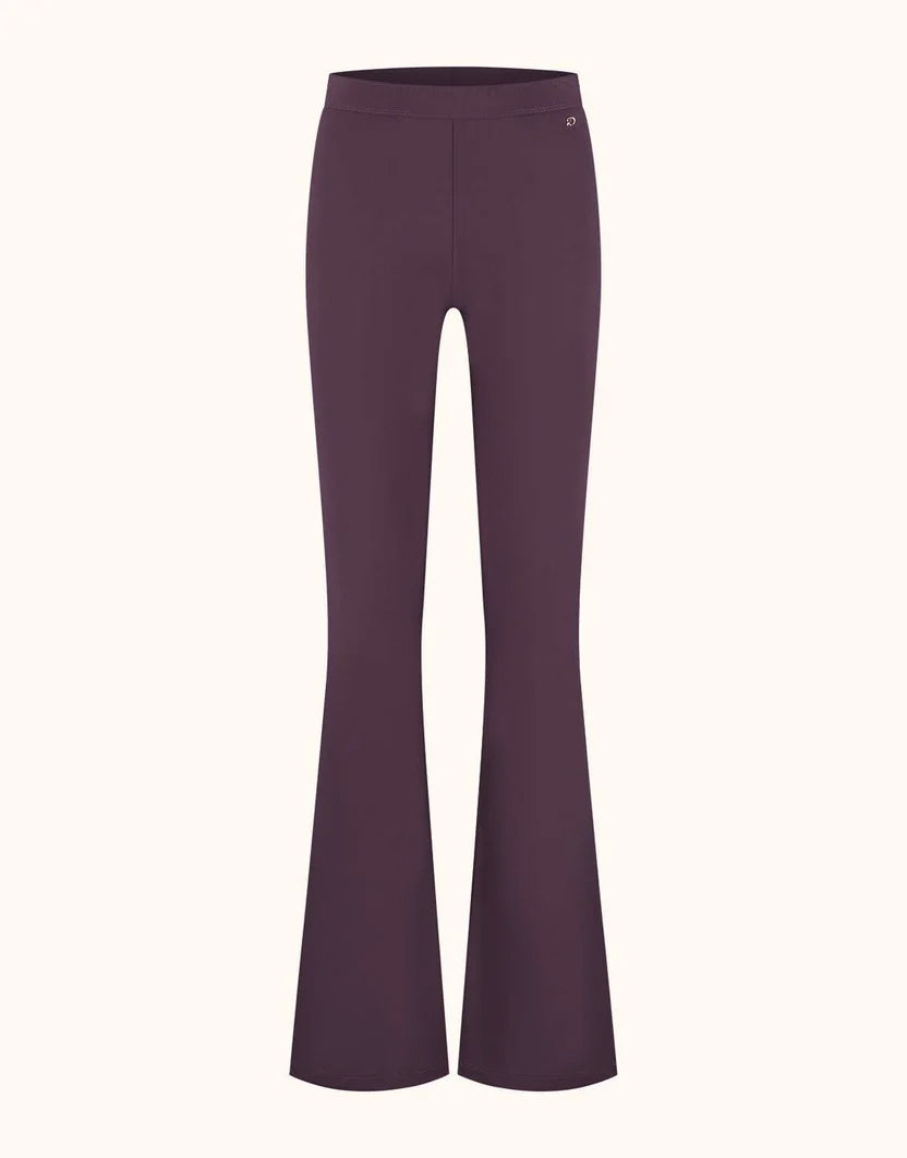 Packshot of the Lima Deep Aubergine trousers in jersey lycra with a high waist.