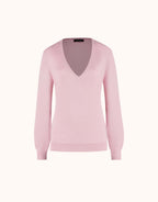 Packshot of the Loretta Pale Rose jumper in organic cotton knit with a deep V-neck.