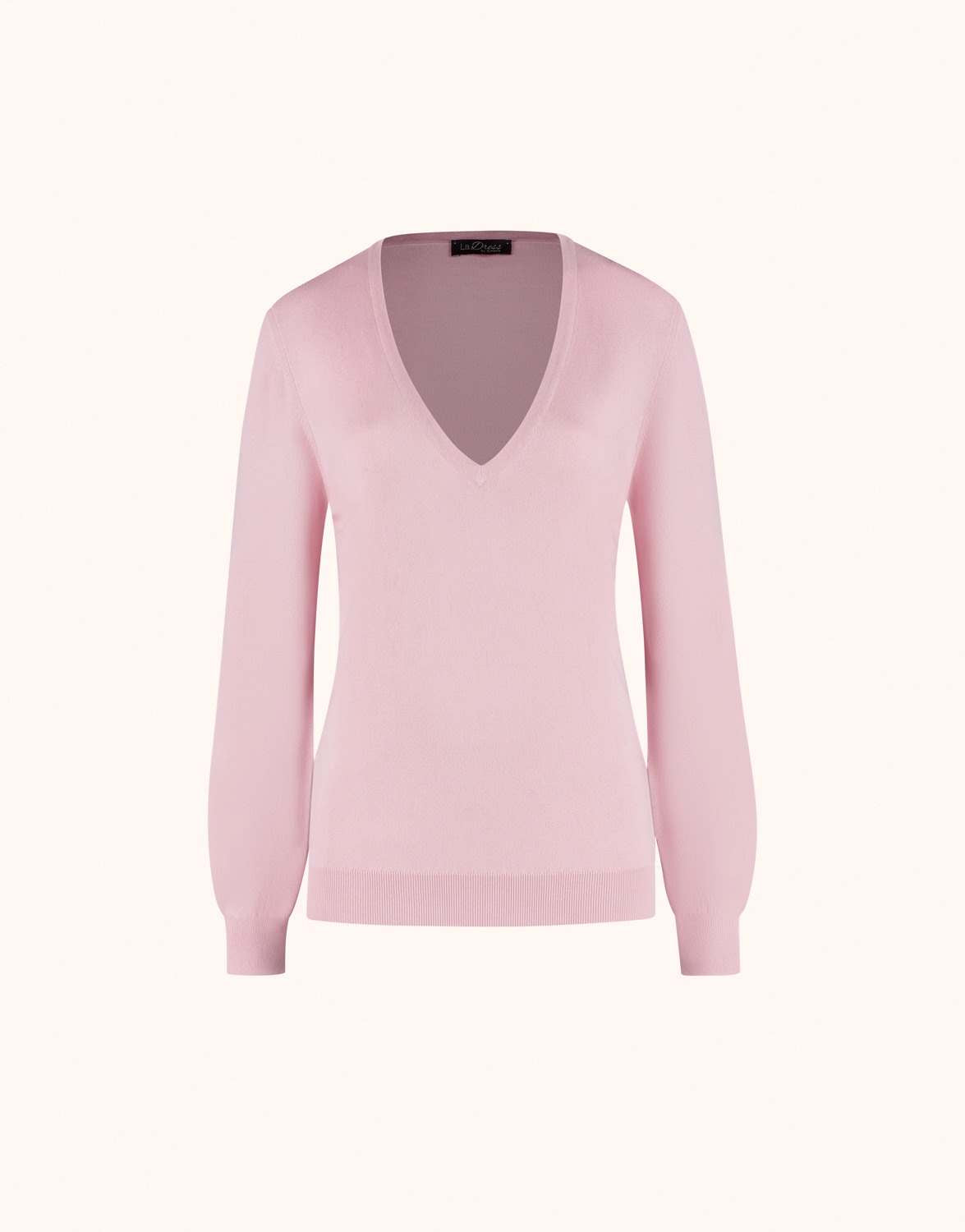 Packshot of the Loretta Pale Rose jumper in organic cotton knit with a deep V-neck.