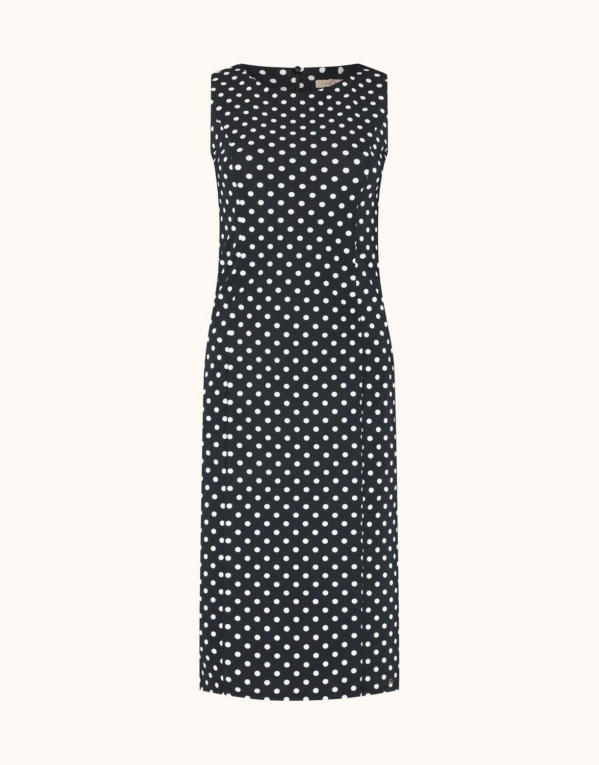 Packshot of the Gloria Ivory Small Dot dress in jersey lycra with a small polka dot print.
