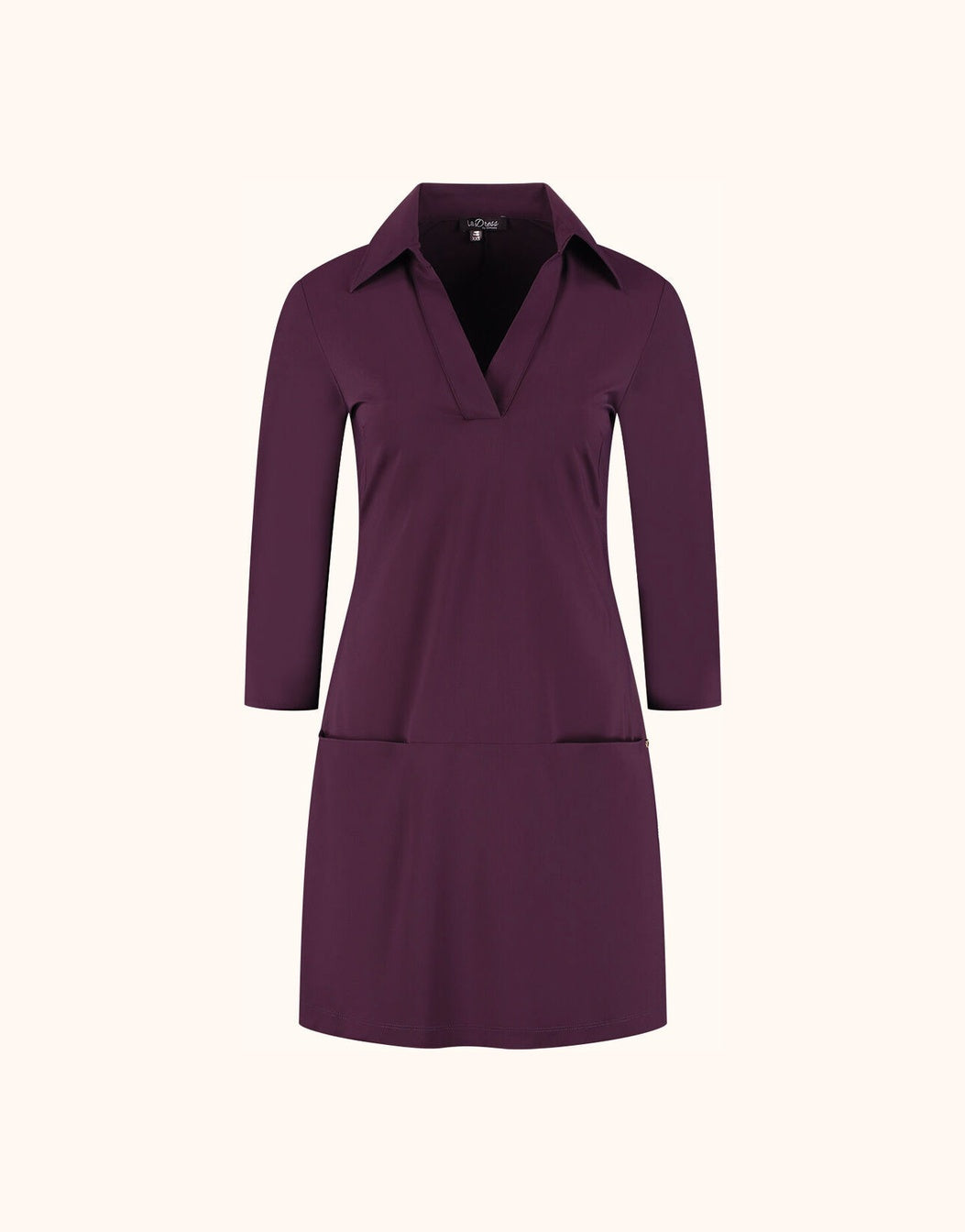 Packshot of the Nala Deep Aubergine dress in jersey lycra with a collar and patch pockets.