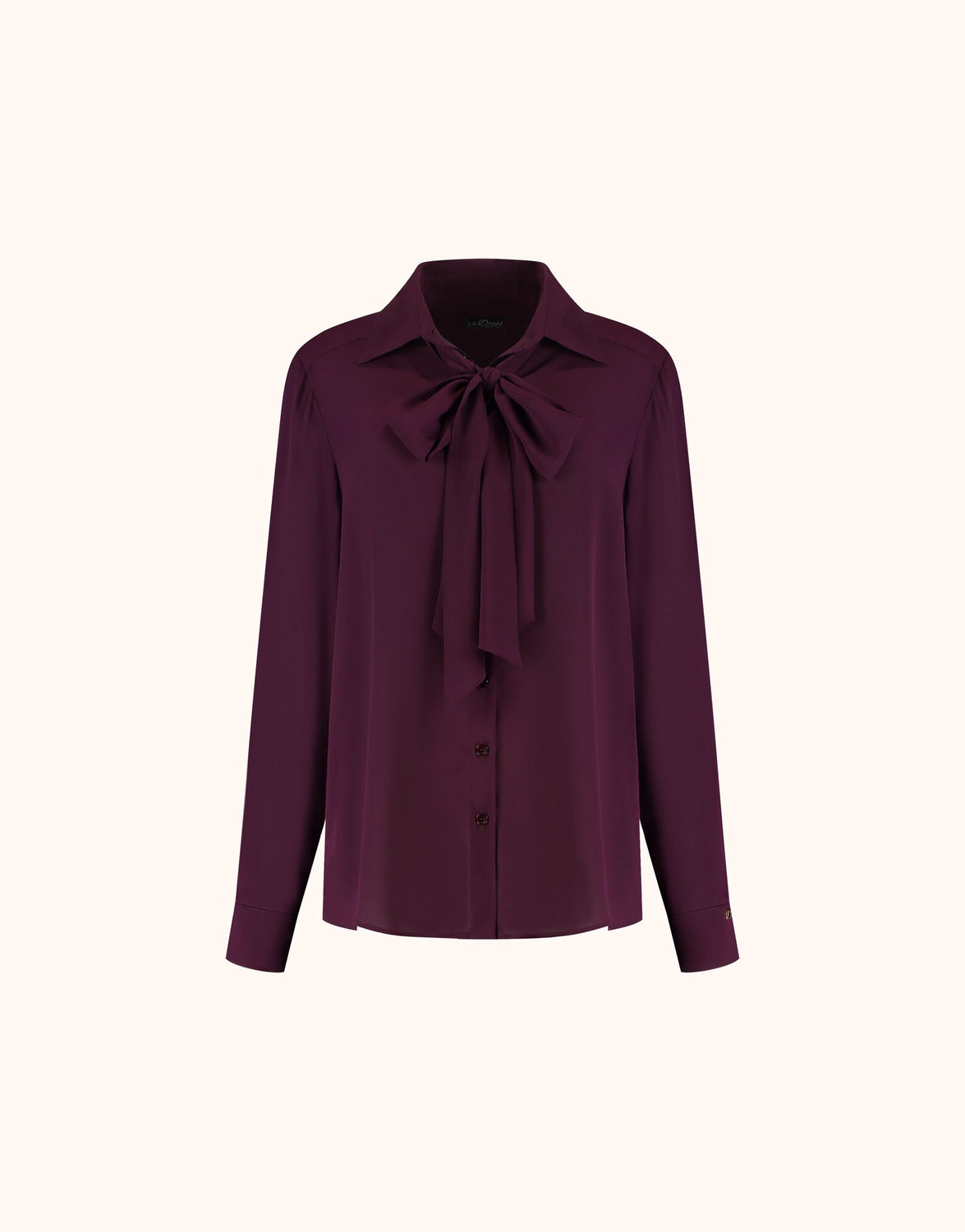 Packshot of the Kris Deep Aubergine blouse in crepe georgette with a pussy bow collar.