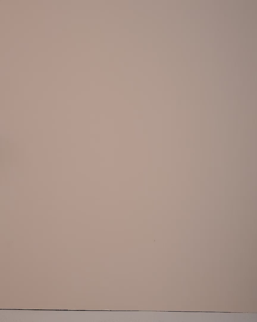 Video of a model wearing the Eloise Ivory blouse in satin with ivory trousers.