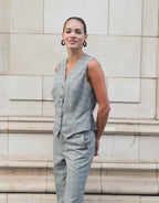 Video of a model wearing the Jules Light Grey Check waistcoat in stretch woven.