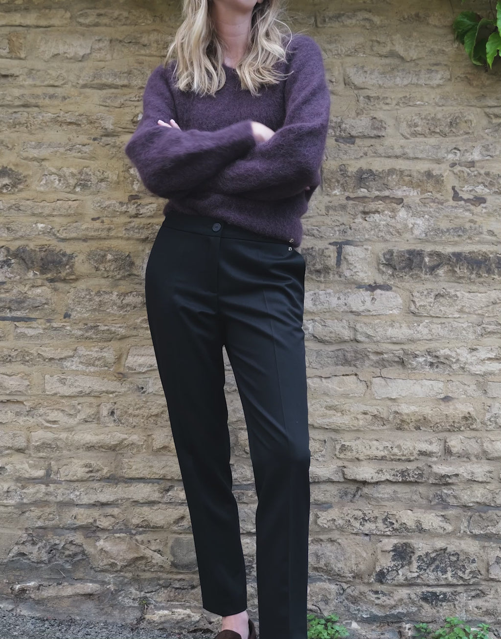 Video of a model wearing the Valetta Black trousers in viscose blend suiting.
