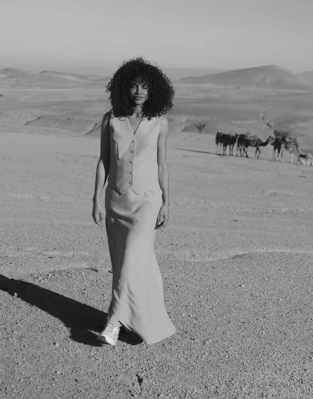Video of a model wearing the Charlize Ivory waistcoat in crepe satin with matching trousers.