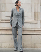 Video of a model wearing the Naples Light Grey Check trousers in stretch woven.