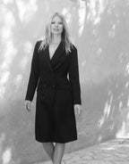 Video of a model wearing the Colette Raspberry Red dress in crepe satin with long sleeves.